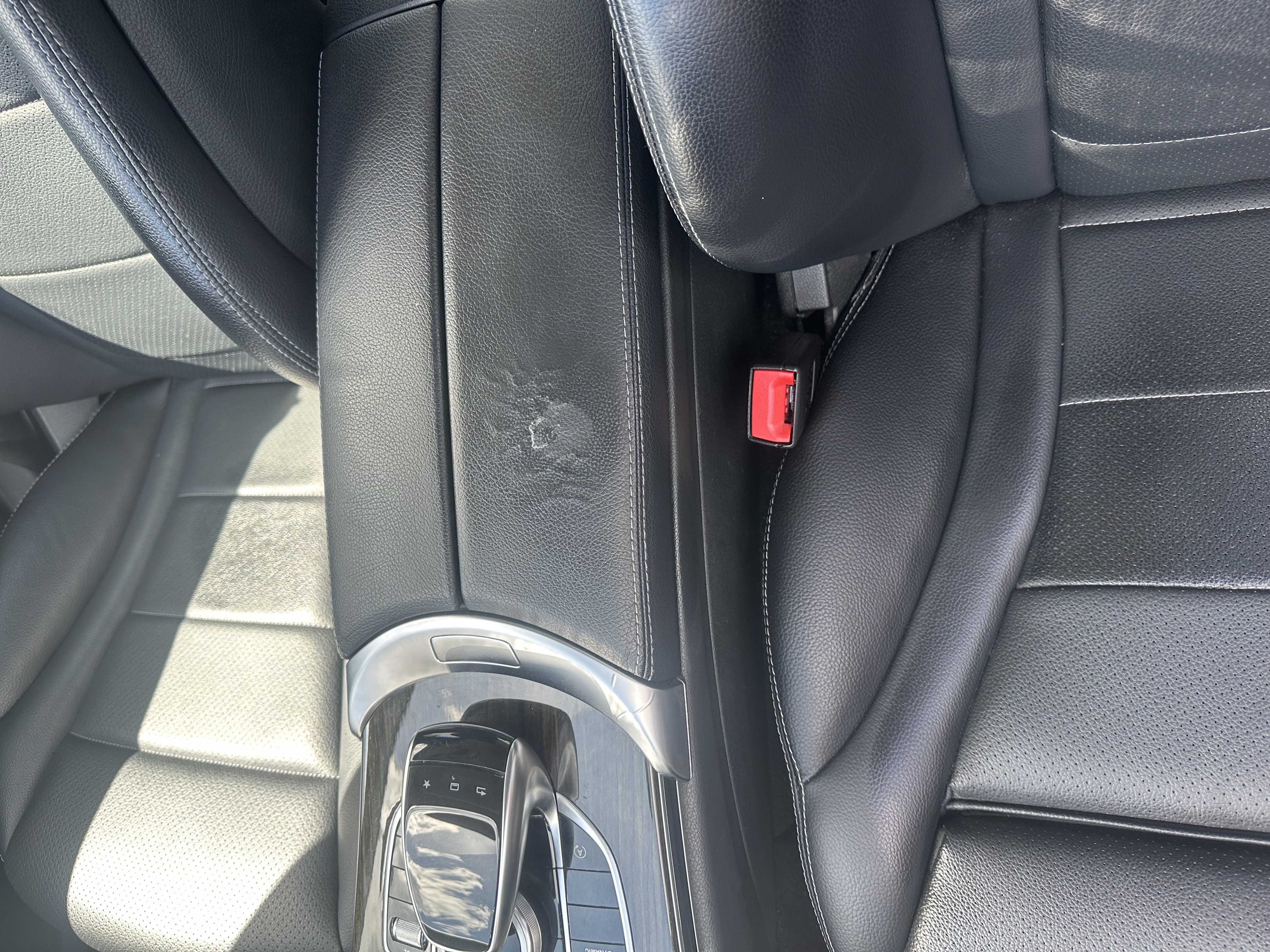 Cracked armrest before restoration