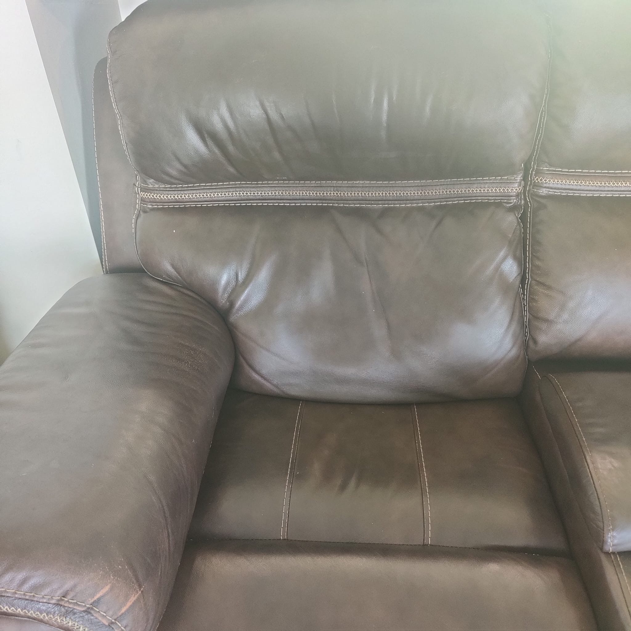 Restored leather couch after service