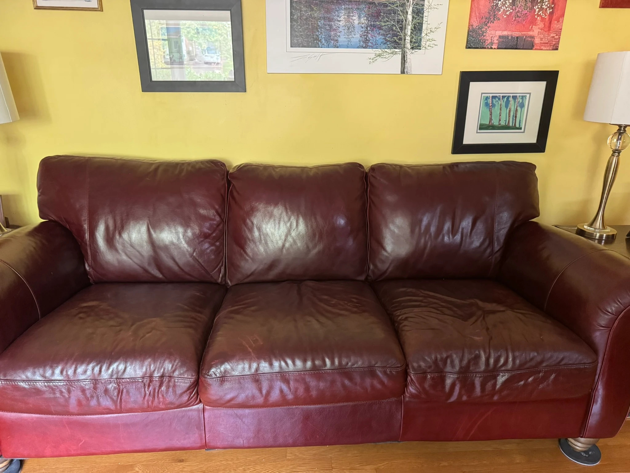 Repaired leather sofa after service
